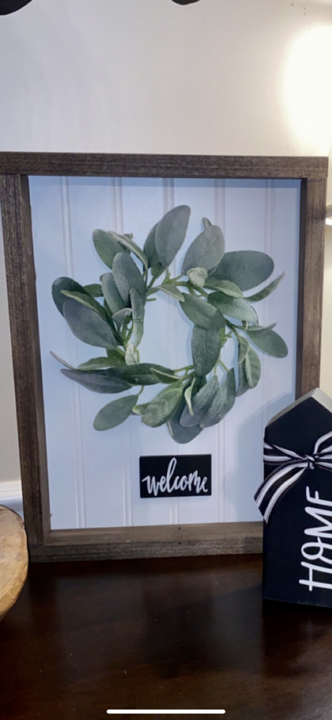 Framed wreath sign