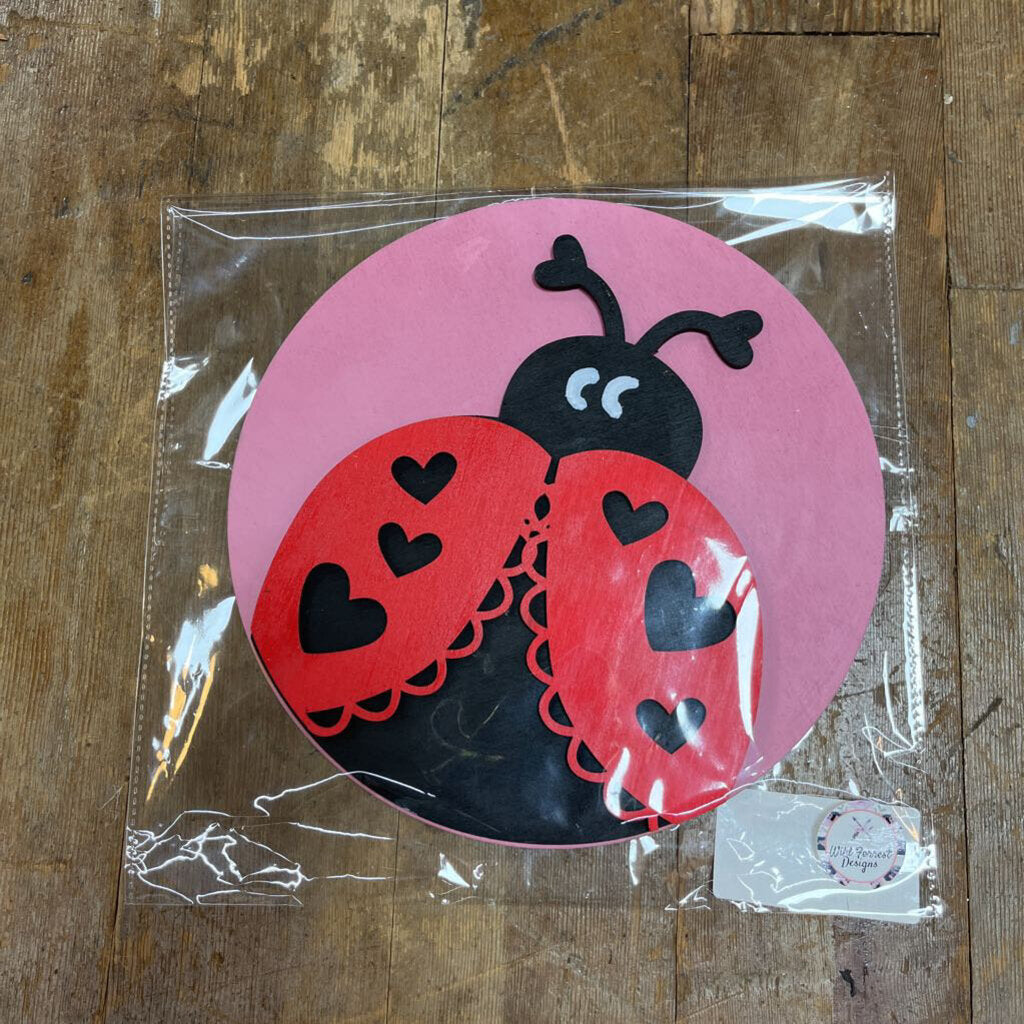 Ladybug Mauve Background Round CAE