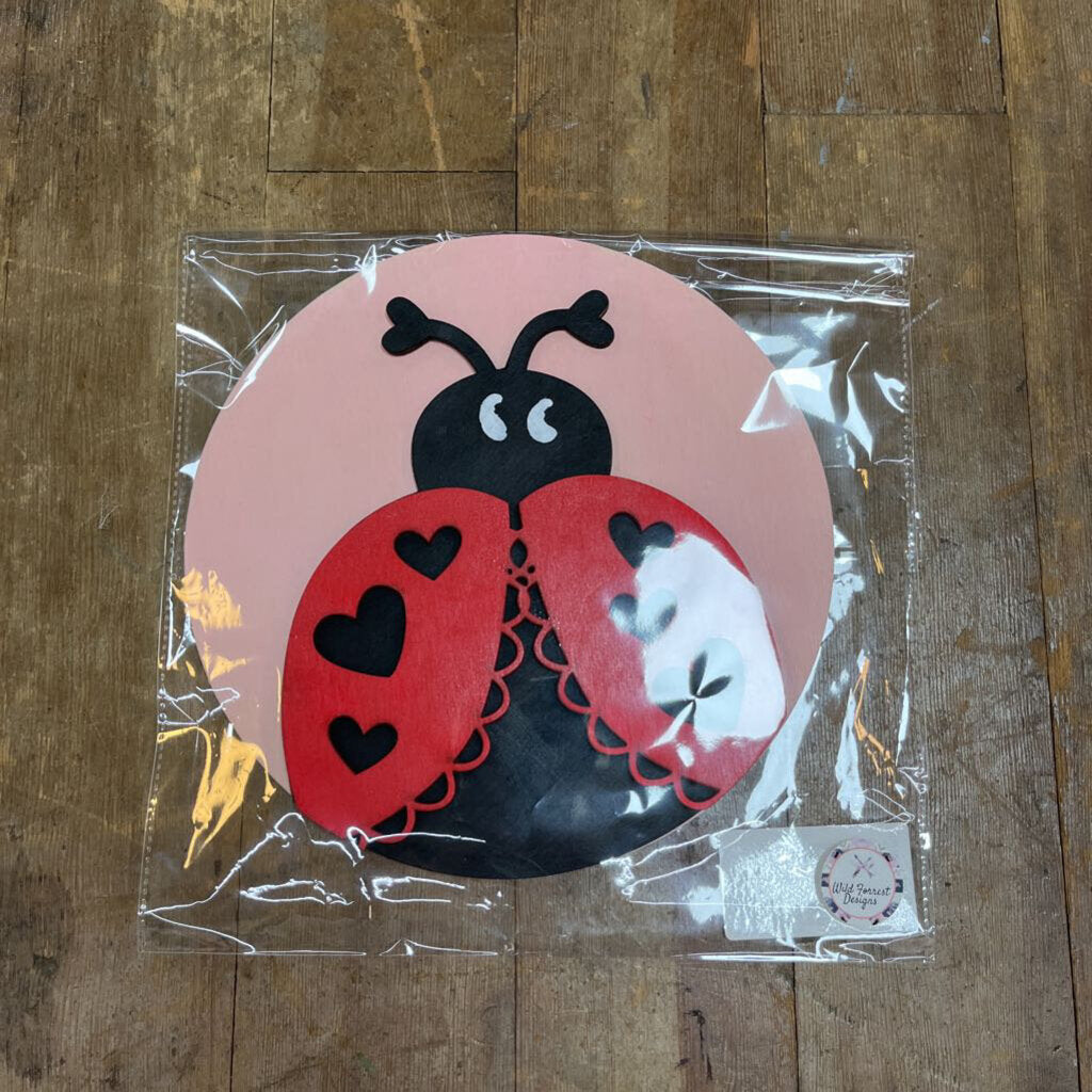 Ladybug Light Pink Background Round CAE