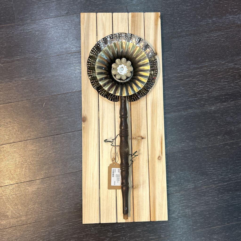 Large repurposed sunflower on board