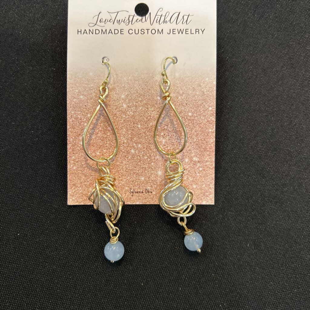 Wire wrapped gold dangle earrings with semi-precious blue stones