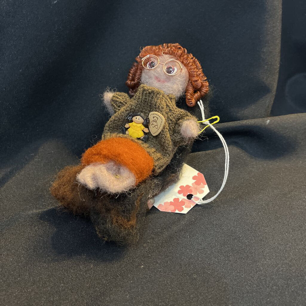 Girl on Chair w/doll (brown)