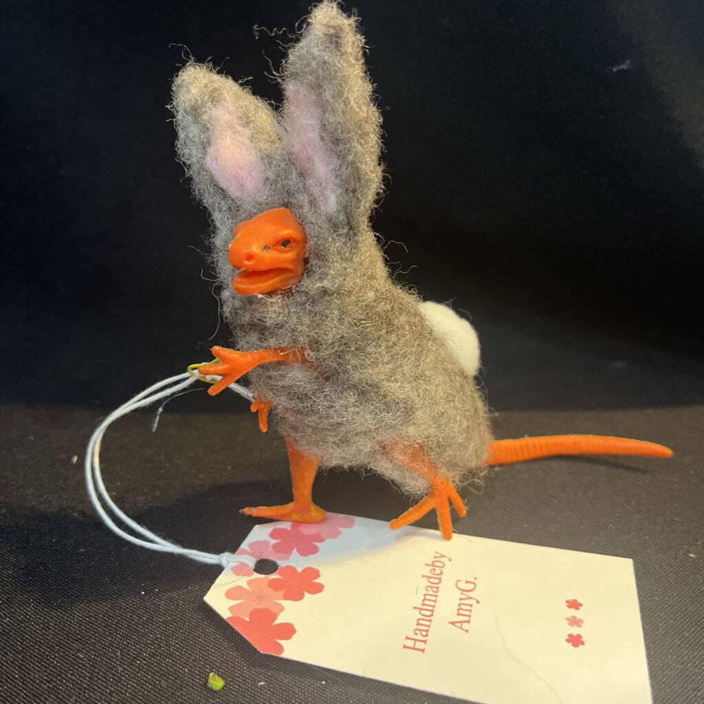 Plastic Dino in Bunny Costume