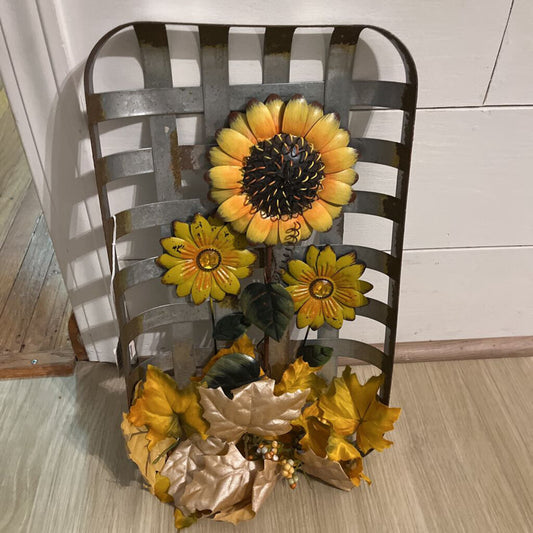 sunflowers in metal weaved basket