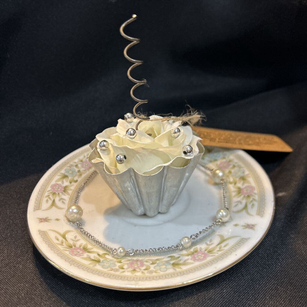 Vintage tart tin, spring cupcake on antique china