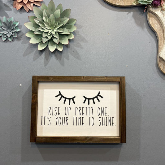 Rise up pretty one sign