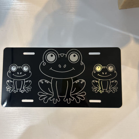 3 Frogs Metal Front License Plate