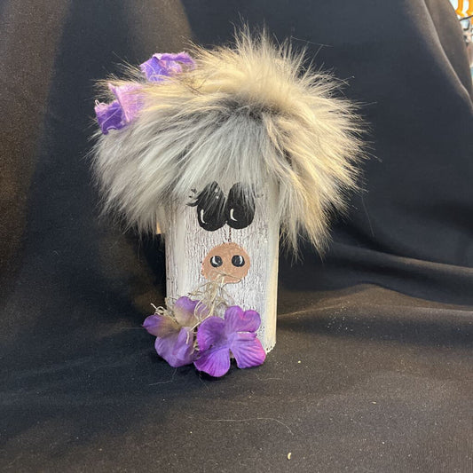 Wooden Cow w/gray hair & purple bow