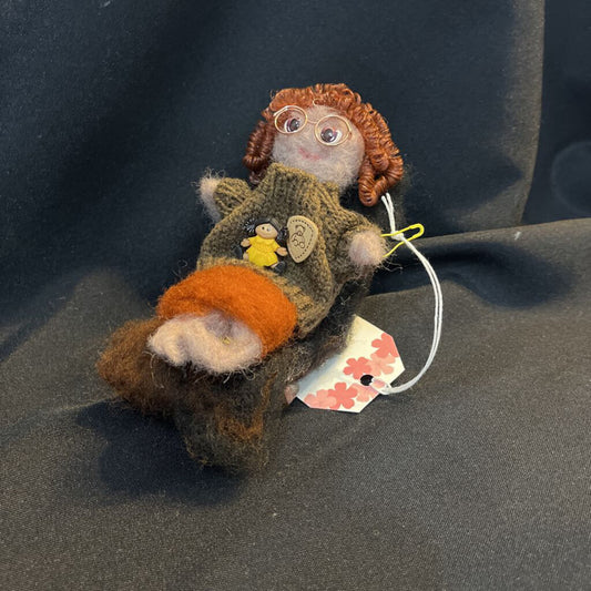 Girl on Chair w/doll (brown)