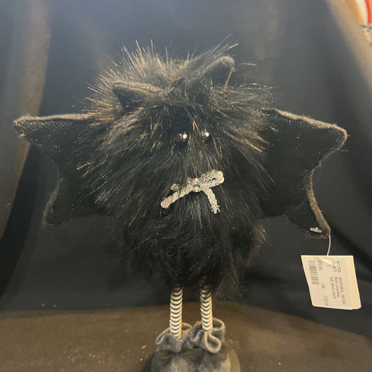 Bats (standing, tall, black)