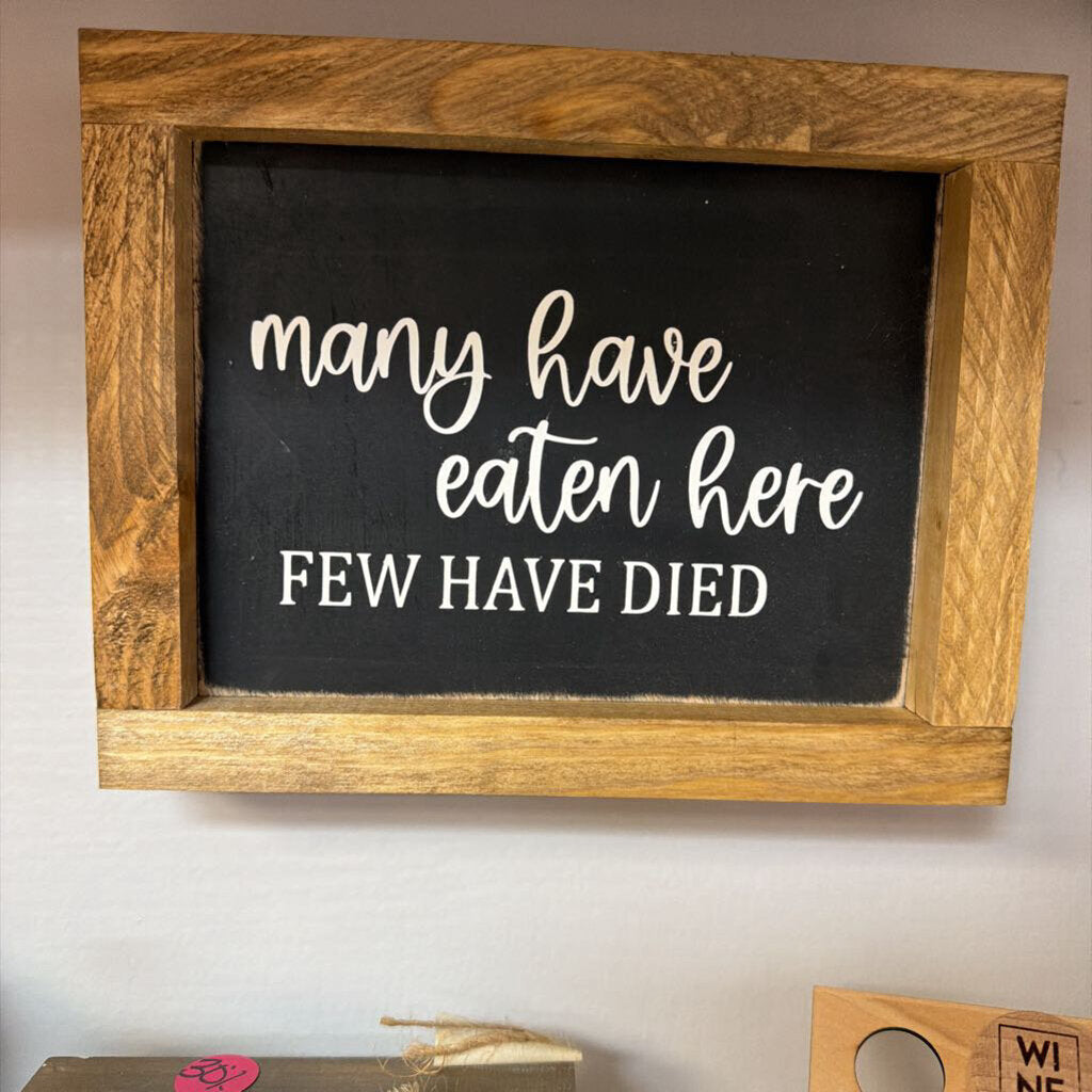 Many have eaten here (framed sign)