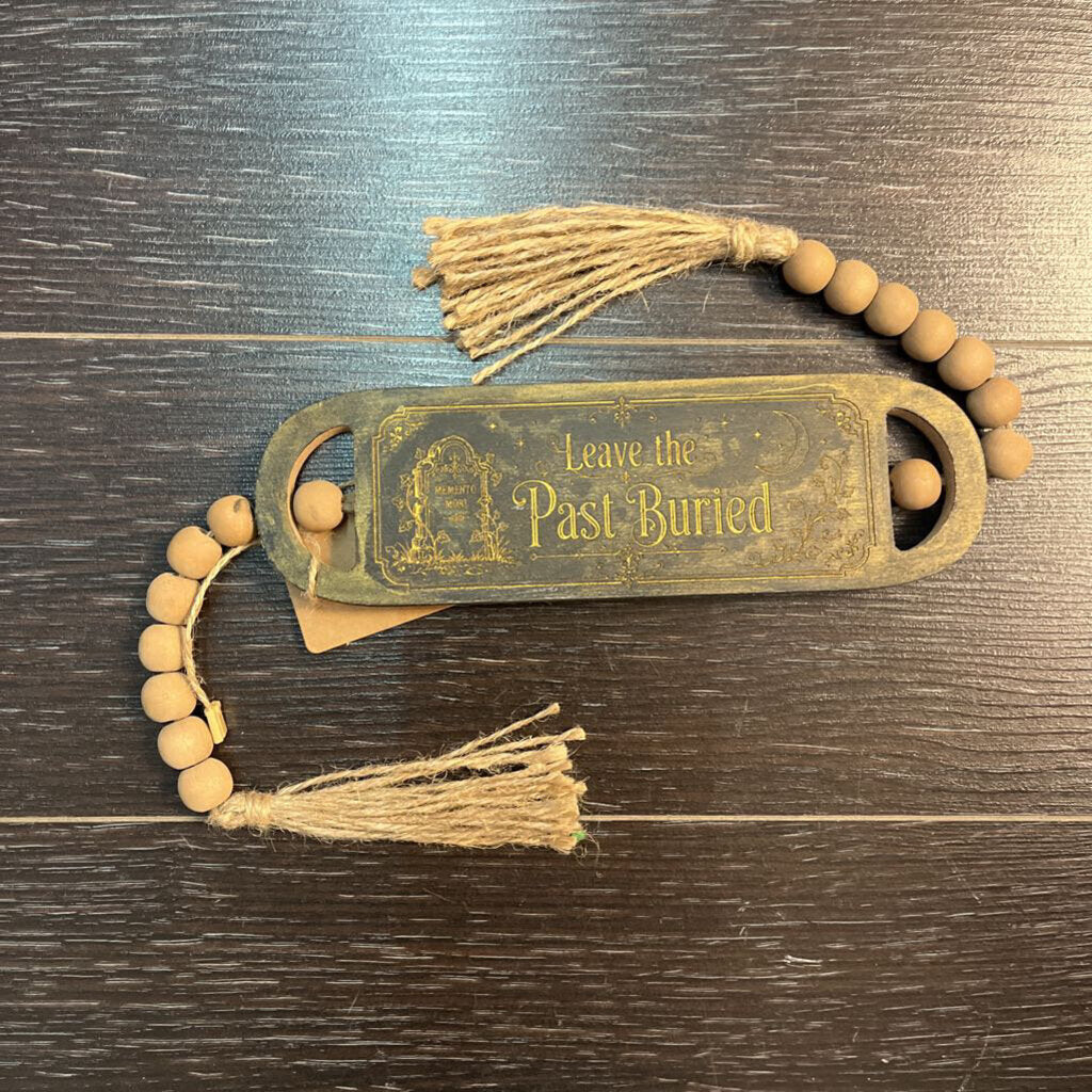 Leave the past buried, wood bead sign