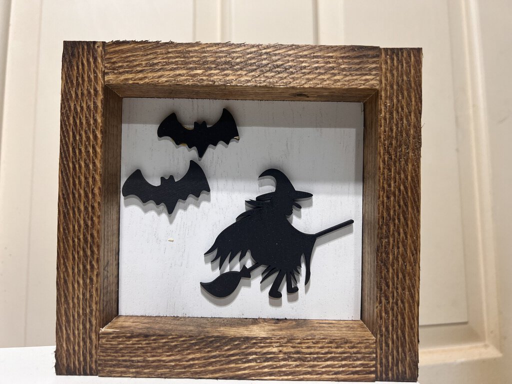 Witch with bats